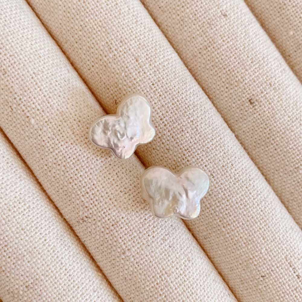 Butterfly shaped pearl earring studs